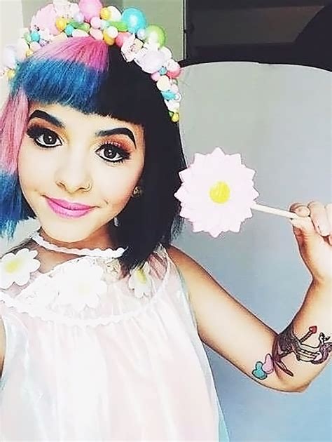 Melanie Martinez (born 1972) is an actress and comedian who performed Melanie the Babysitter, the first host of The Good Night Show, for the show's first two seasons from September 26, 2005 to July 2006. She originated the Welcome and Goodnight Songs, as well as the "Hush, Hush, Little Fish" poem that was recited to her character's pet goldfish, Hush. Martinez was one of Sprout's first two ...